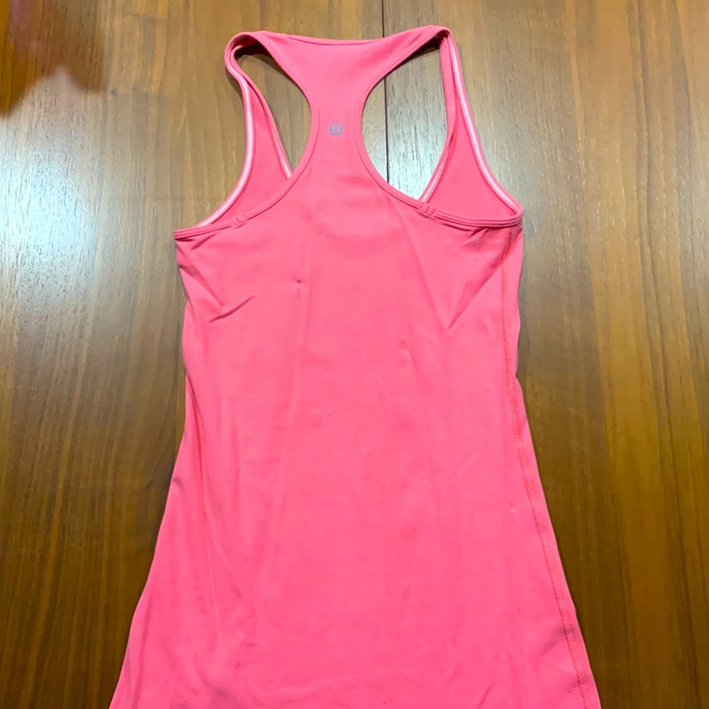 Lululemon mango colored racerbqck tank top size 4 longer length